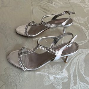 Gently worn silver strappy shoe, small diamonds on straps, 3 “ leather heal